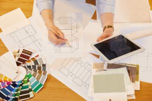 Designer is designing the patterns of the packaging.